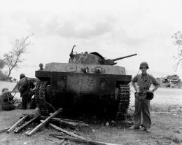 Type_2_Ka_Mi_amphibious_tank_from_1st_Yokosuka_SNLF_on_Saipan_1944.jpg