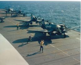 F4U-4CorsairaircraftofVMF-323appearingtohavecrashedonthedeckoftheUSSSicily-1.thumb.jpg.9e6913303532cc89057bb6bb3ec45784.jpg