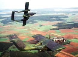 66df4126ebde66fcd4a7568b_66df3e37aa3169f35da5ef49_1280px-OV-10As_601st_TASW_over_Germany_1982.jpeg